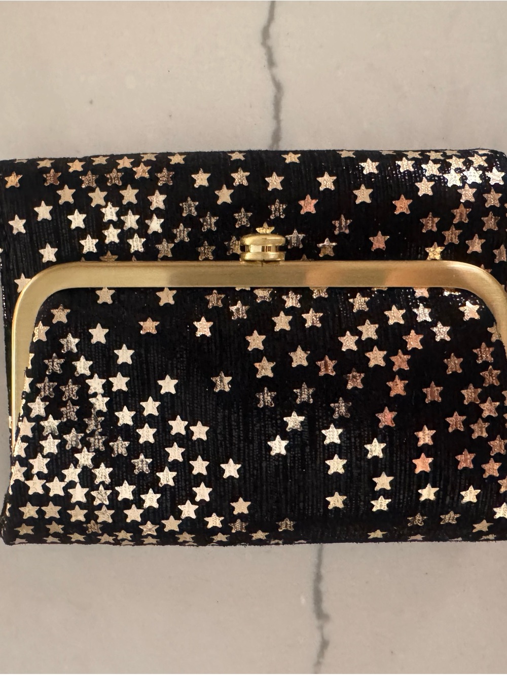 HOBO Black Star-Print Clutch with Gold Frame
